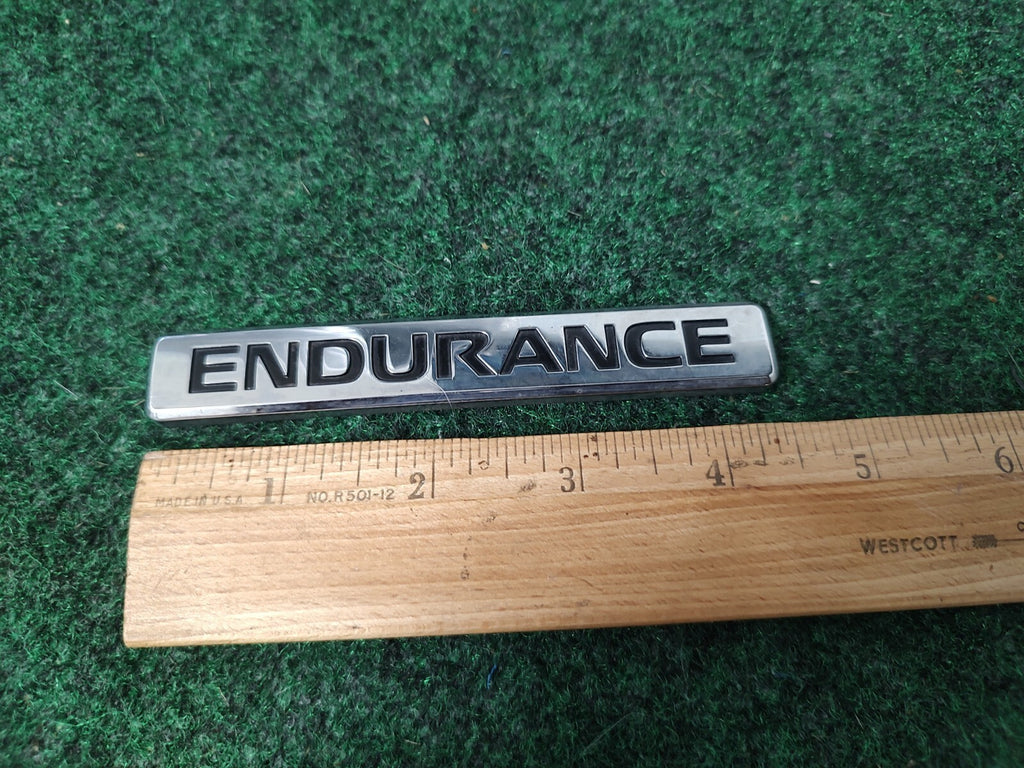 Nissan Endurance Emblem Badge Decal Logo Titan Armada OEM Factory Genuine 1M4