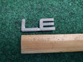 Toyota OEM LE Chrome Emblem Badge Logo Nameplate Name Plate 2S2