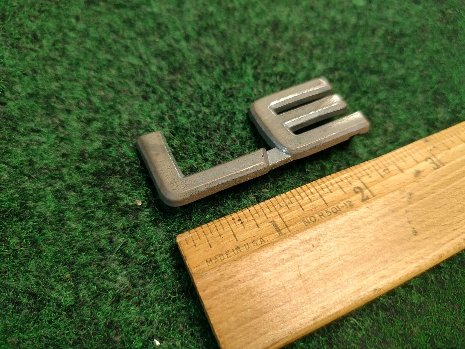 Toyota OEM LE Chrome Emblem Badge Logo Nameplate Name Plate 2S2