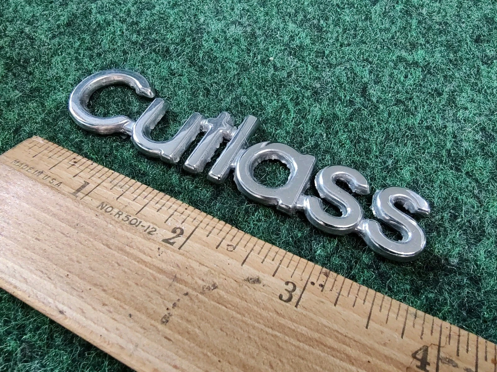 Oldsmobile Cutlass Emblem Nameplate Chrome Metal OEM 1S1