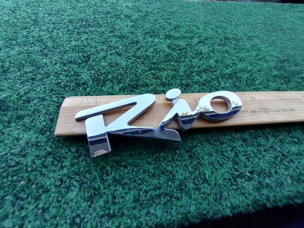 Kia OEM 2000-2005 Rio Chrome Rear Gate Emblem Badge Logo Nameplate Name 10L4