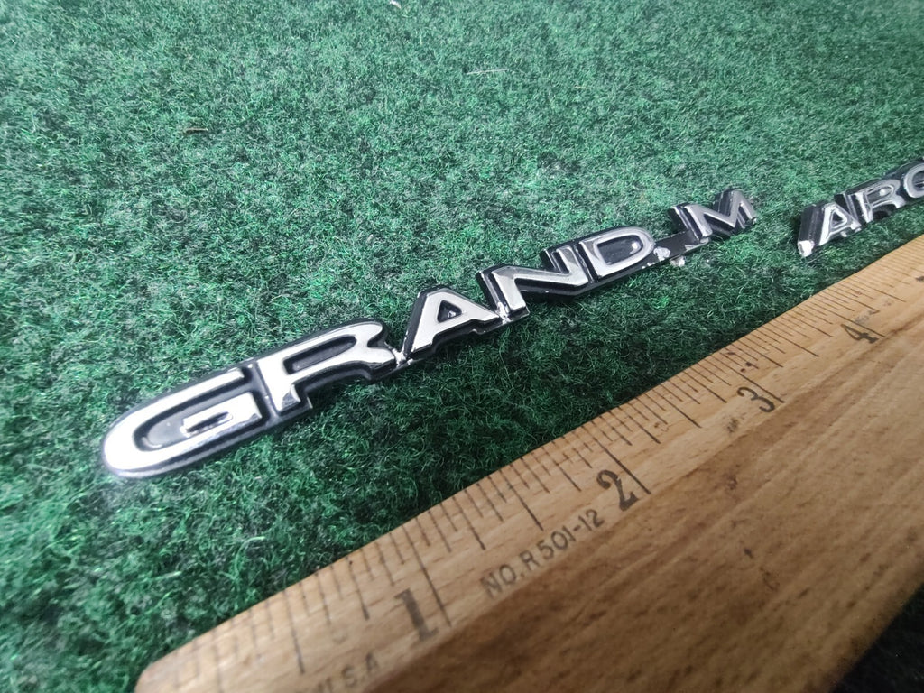 98 99 00 01 02 MERCURY GRAND MARQUIS GS REAR EMBLEM LOGO BADGE SYMBOL Chrome 8L3