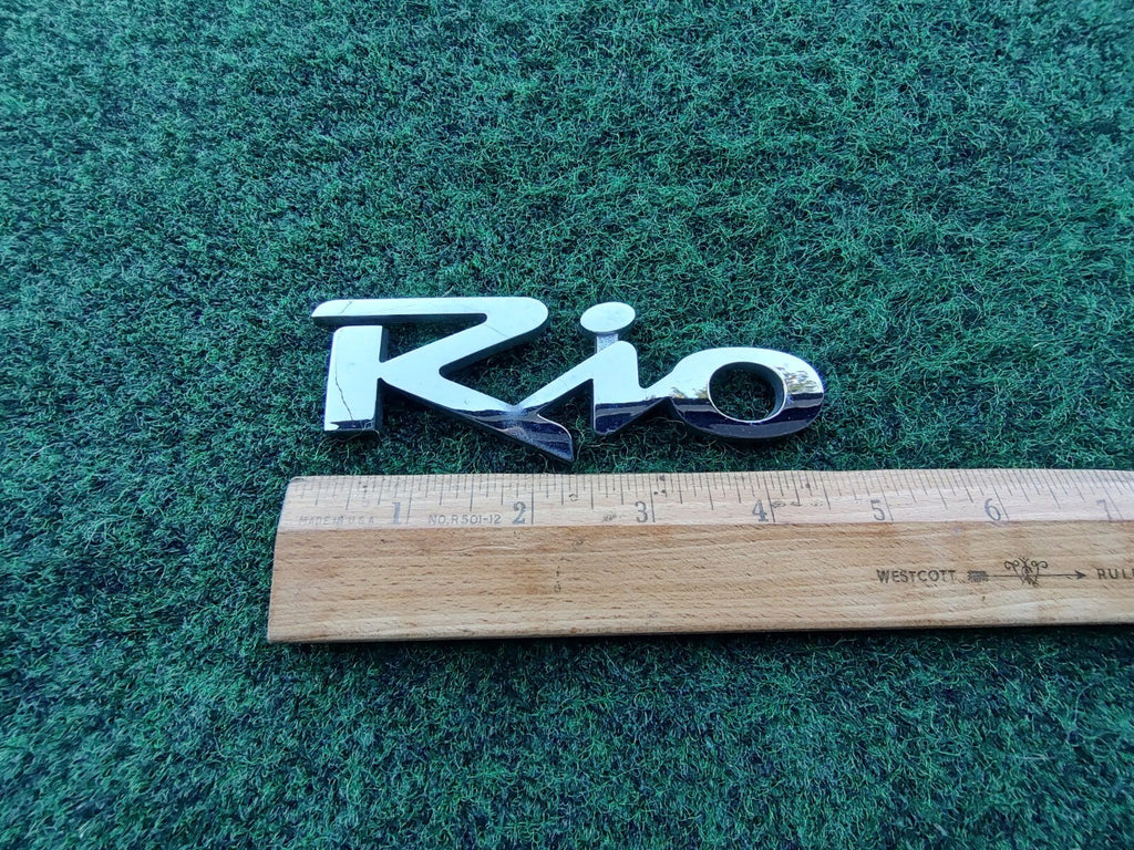 Kia OEM 2000-2005 Rio Chrome Rear Gate Emblem Badge Logo Nameplate Name 10L4