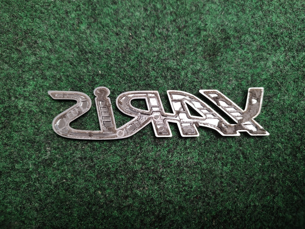 2006-2011 TOYOTA YARIS REAR EMBLEM LOGO BADGE SYMBOL CHROME LETTERS OEM 1S2