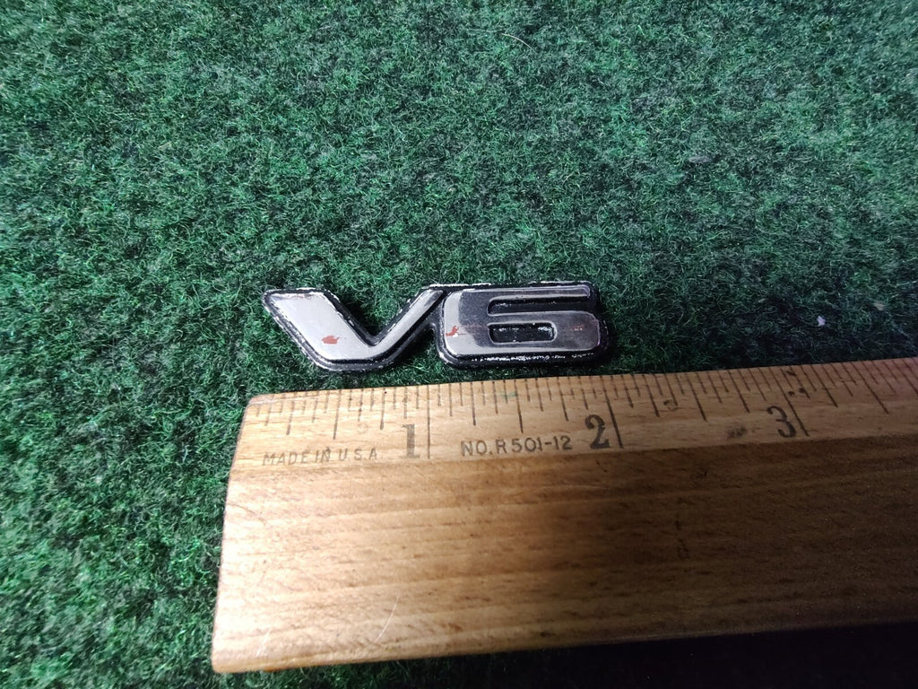 Pontiac OEM V6 Chrome Black Plastic Emblem Badge Logo Nameplate Name Plate 5S1