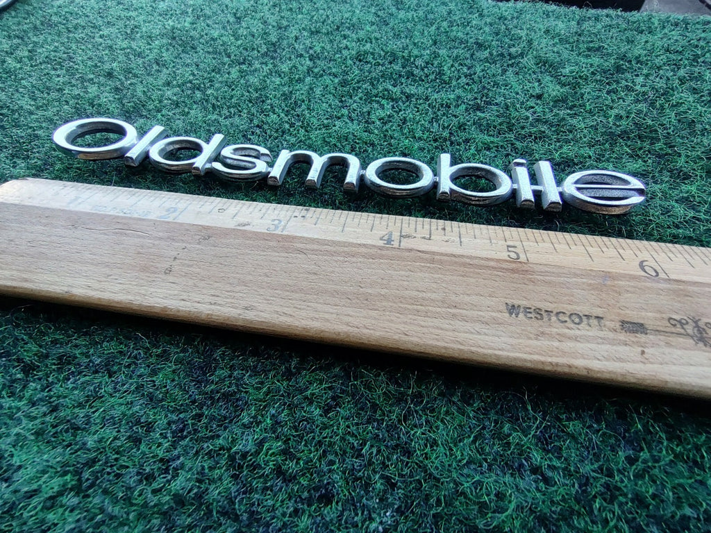 Oldsmobile OEM Chrome Emblem Badge Logo Nameplate Name Plate 10L4