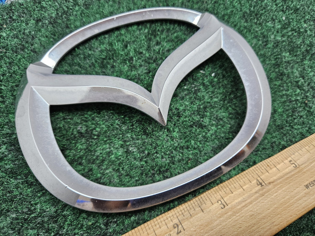 8T24-8C020– AA Mazda Emblem Name Plate 5" Nameplate Badge OEM GL4
