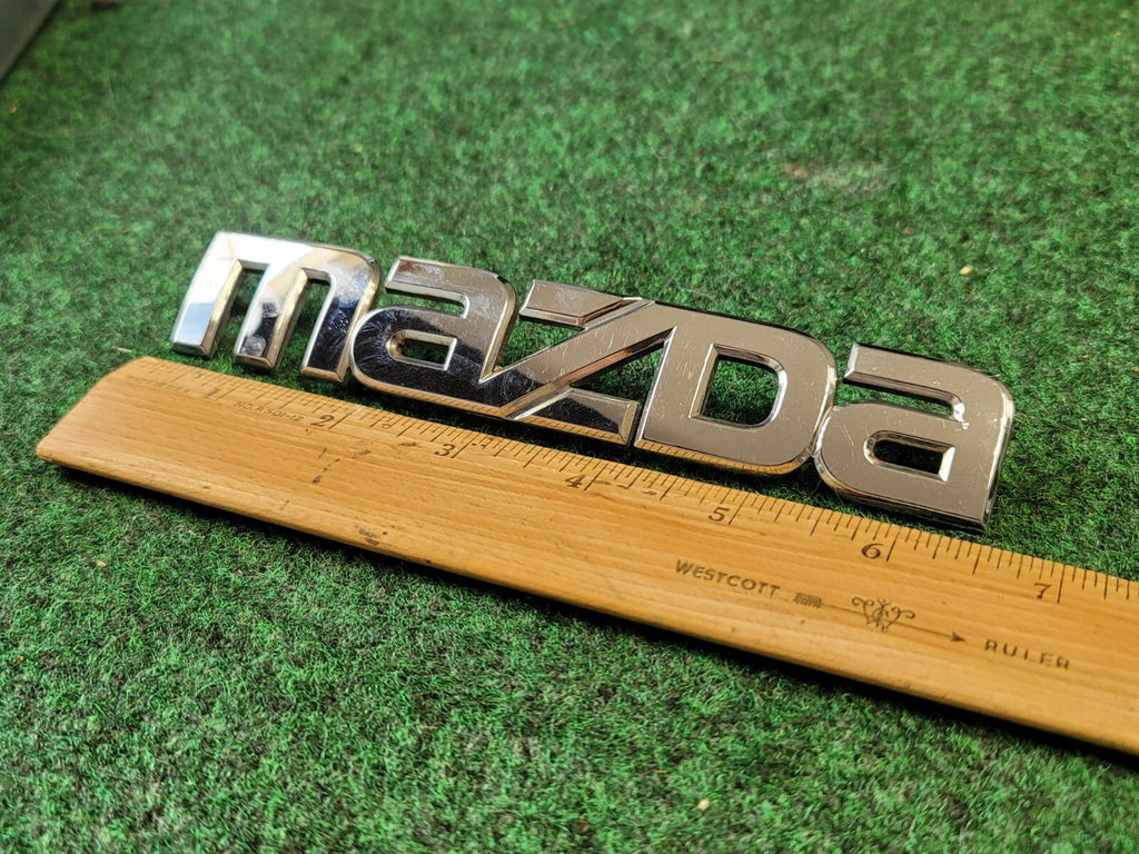 07 08 09 MAZDA CX-7 CX7 REAR GATE LID EMBLEM LOGO BADGE SYMBOL USED OEM 1M3