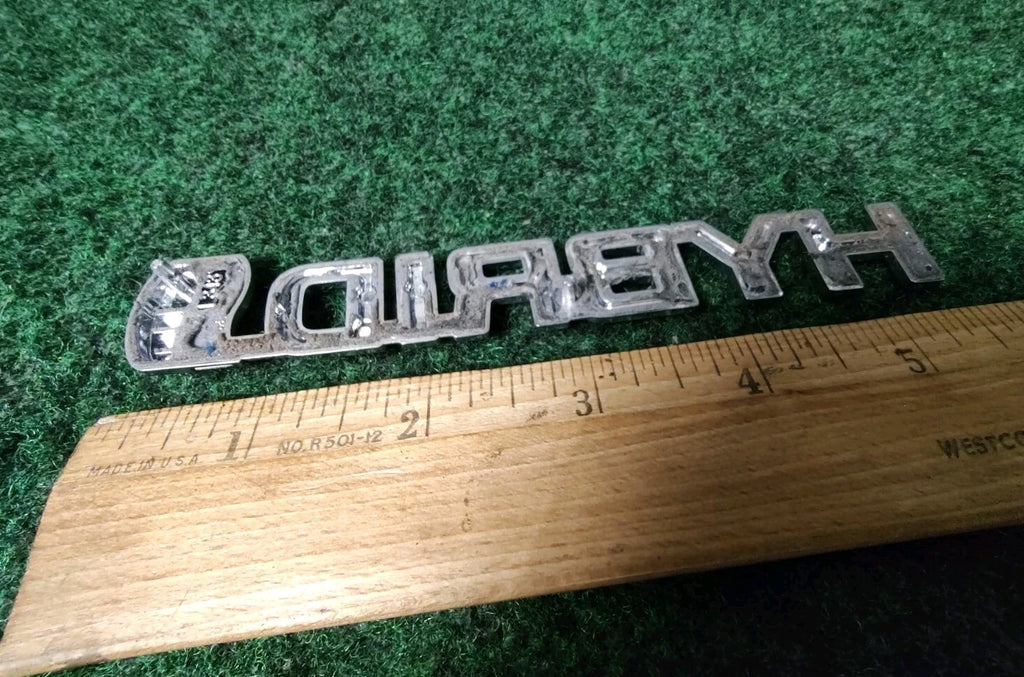 07 08 09 TOYOTA PRIUS HYBRID SIDE FENDER EMBLEM LOGO BADGE SYMBOL USED 7S1